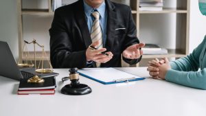 lawyer-businessman-with-clients-make-a-contract-to-2025-03-05-03-53-06-utc-scaled-1-300x169